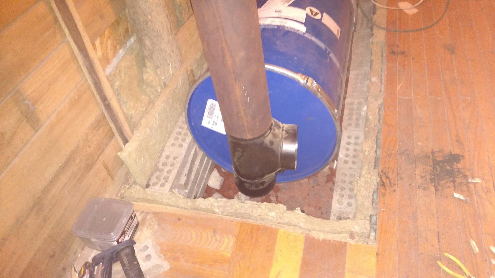 Downstairs Rocket Mass Heater