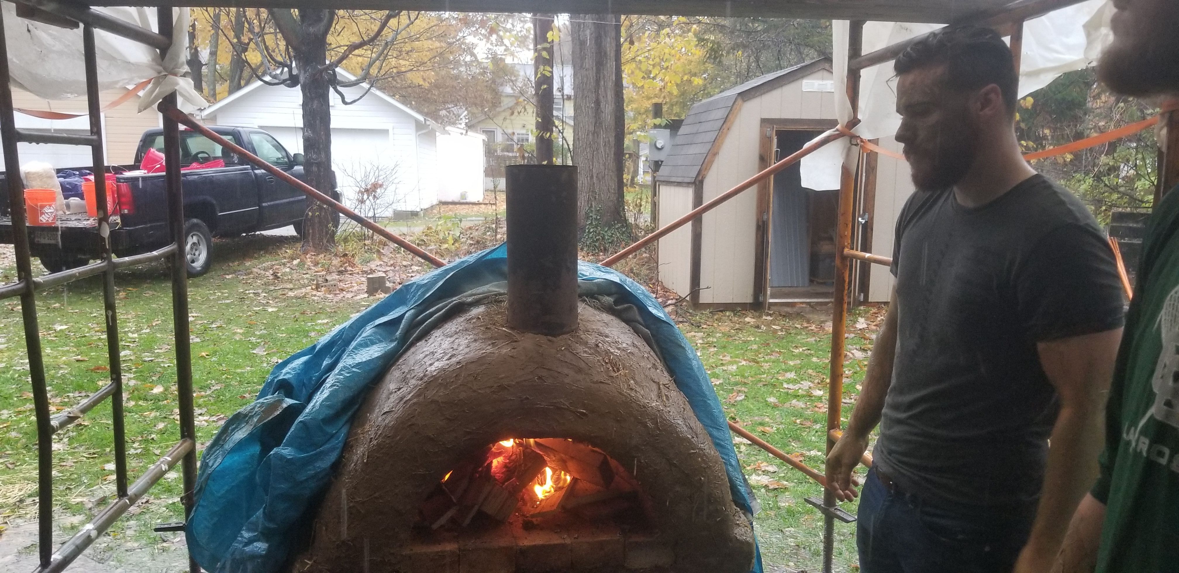 Firing up the Hiram Earthen Cob Oven