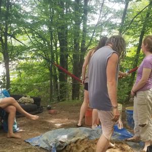Mixing cob on a tarp