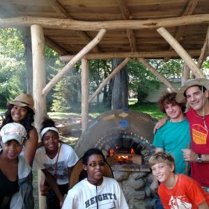 Gearity School Crew in front of their Earthen Cob Oven